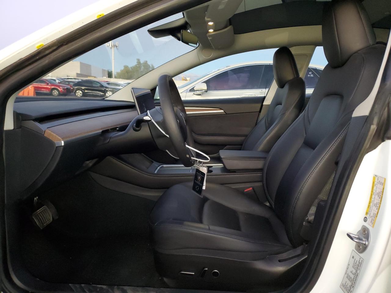 2023 Tesla Model 3 VIN: 5YJ3E1EA2PF590610 Lot: 90106425