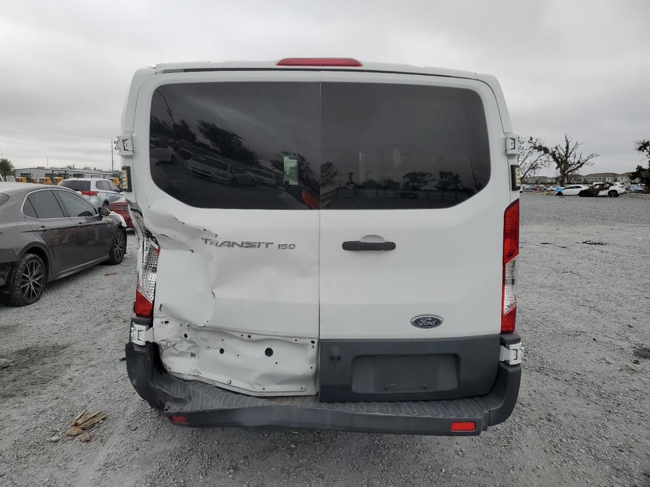 2016 Ford Transit T-150 VIN: 1FTYE1ZMXGKA65310 Lot: 85566765