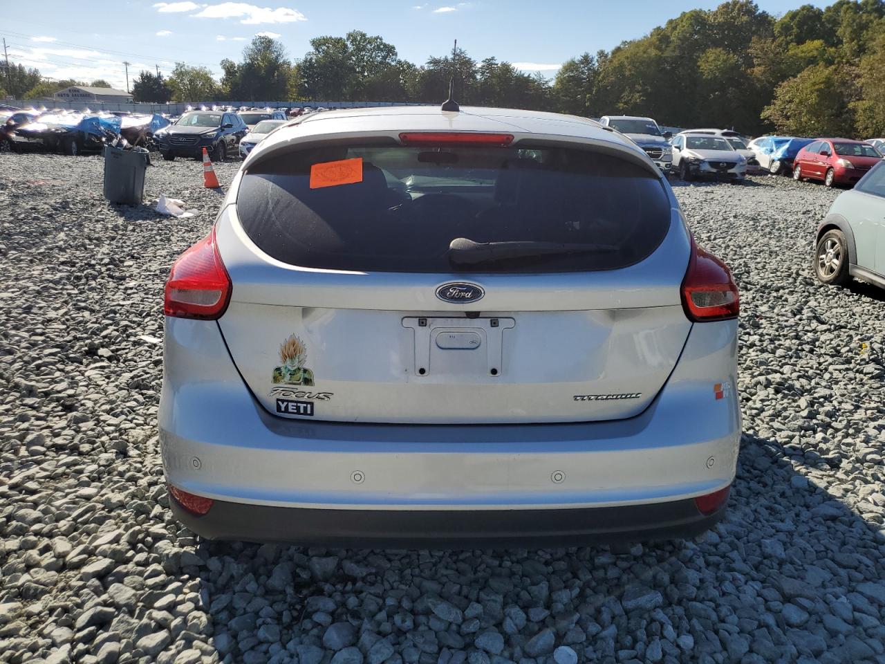 2017 Ford Focus Titanium VIN: 1FADP3N26HL320464 Lot: 82304745