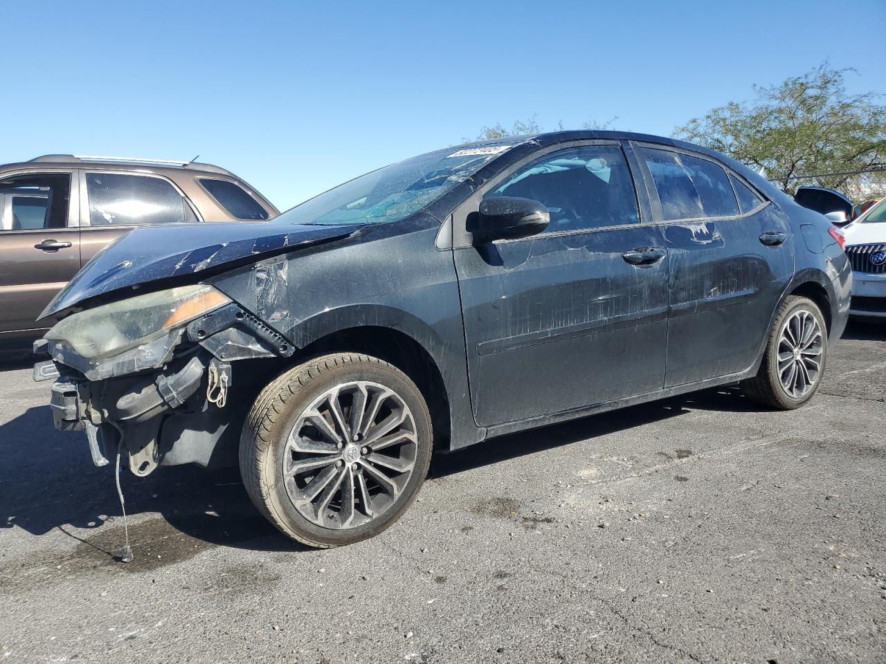 2016 Toyota Corolla L black null gasoline 5YFBURHE4GP387718 photo #1