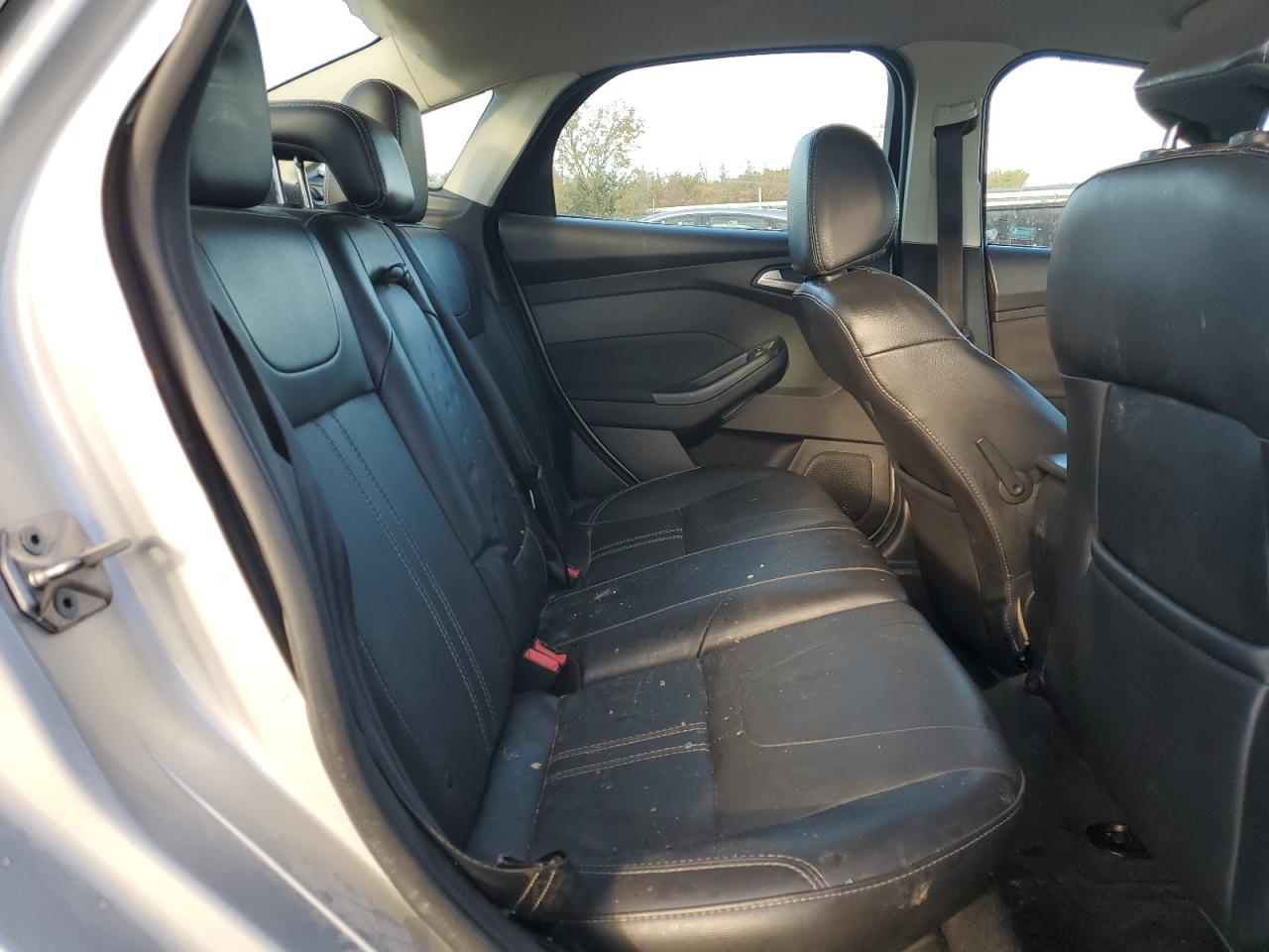 2014 Ford Focus Titanium VIN: 1FADP3J23EL280409 Lot: 82561165