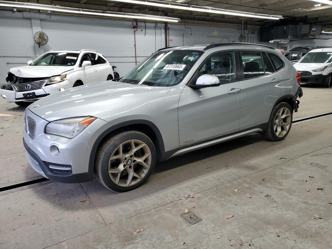 2013 BMW X1 xDrive35I silver hatchback gas WBAVM5C50DVL63922 photo #1