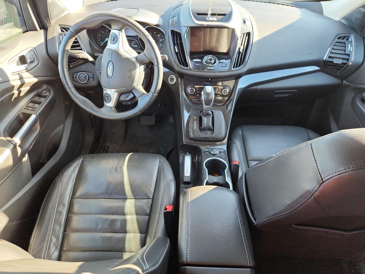 2016 Ford Escape Titanium VIN: 1FMCU9JXXGUC16857 Lot: 85663975