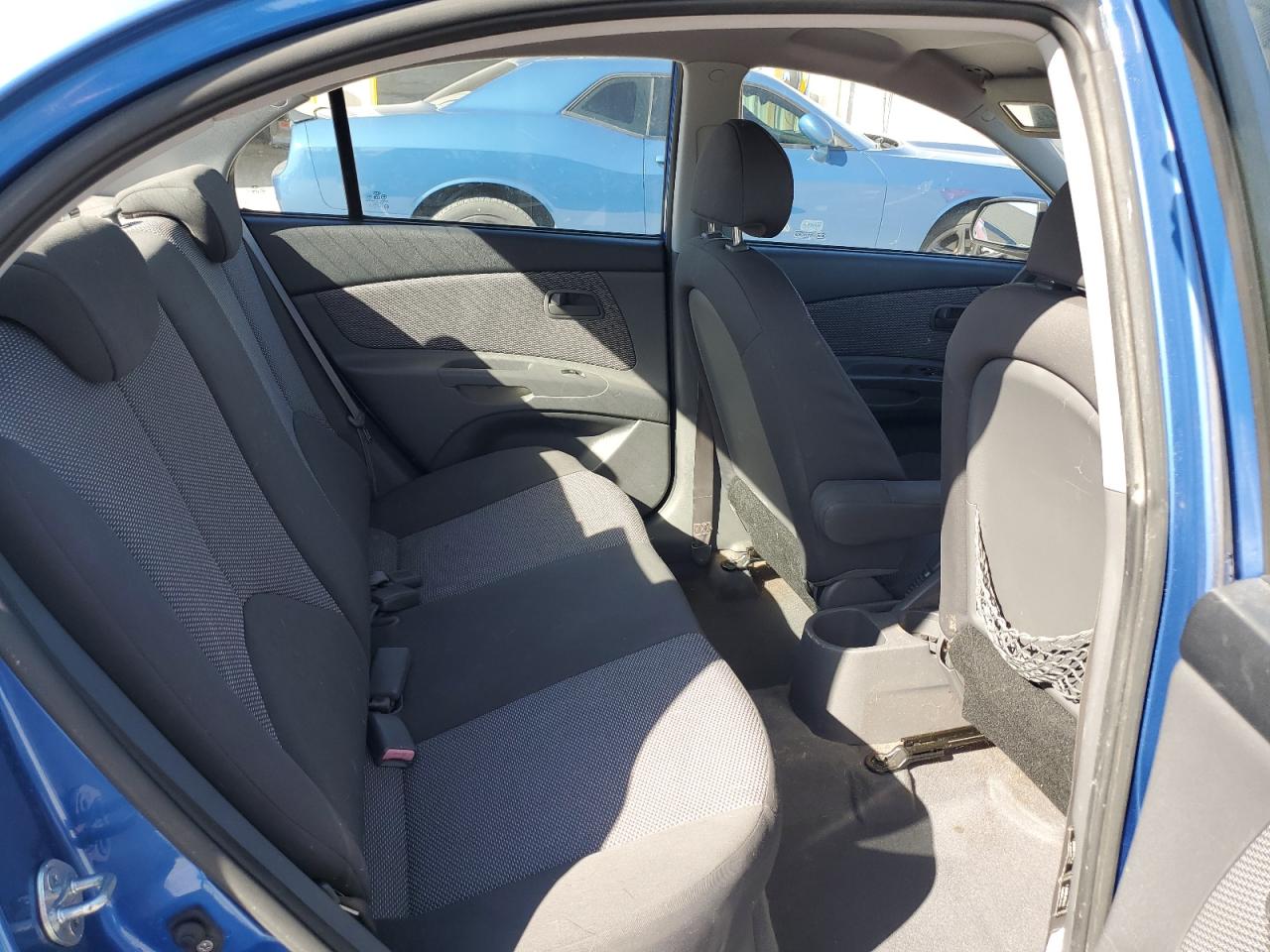 2009 Kia Rio Base VIN: KNADE223296543590 Lot: 89835285