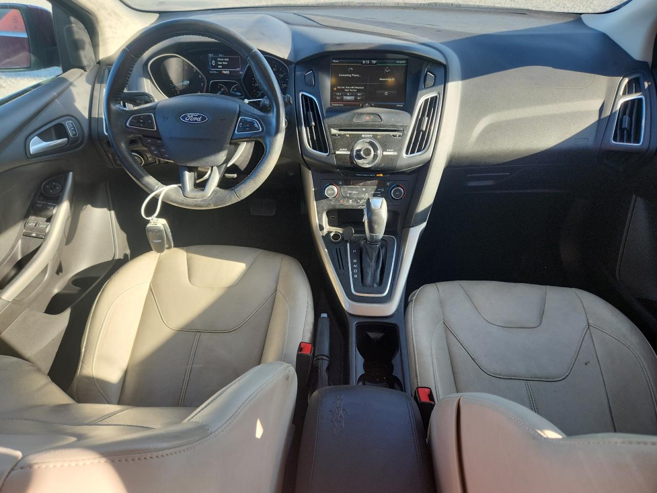 2015 Ford Focus Titanium VIN: 1FADP3N2XFL311179 Lot: 82414325