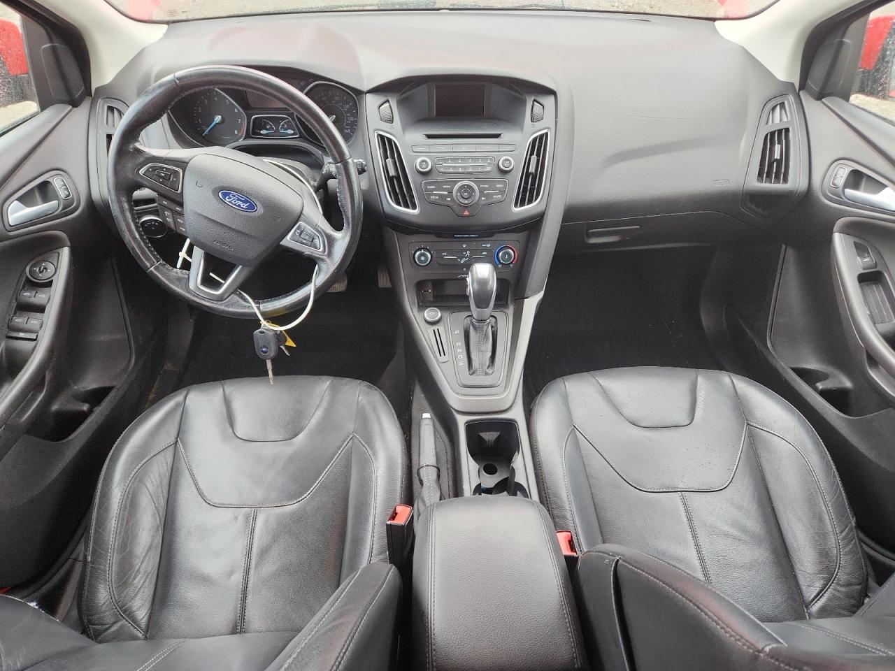 2015 Ford Focus Se VIN: 1FADP3K24FL386710 Lot: 86103505