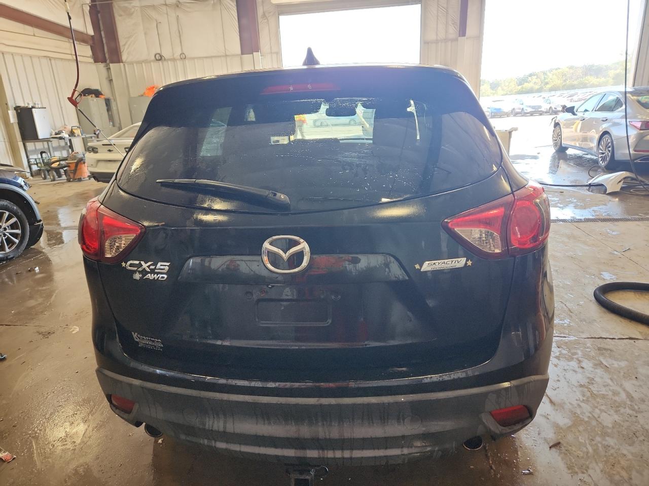 2014 Mazda Cx-5 Touring VIN: JM3KE4CY3E0304246 Lot: 84063375