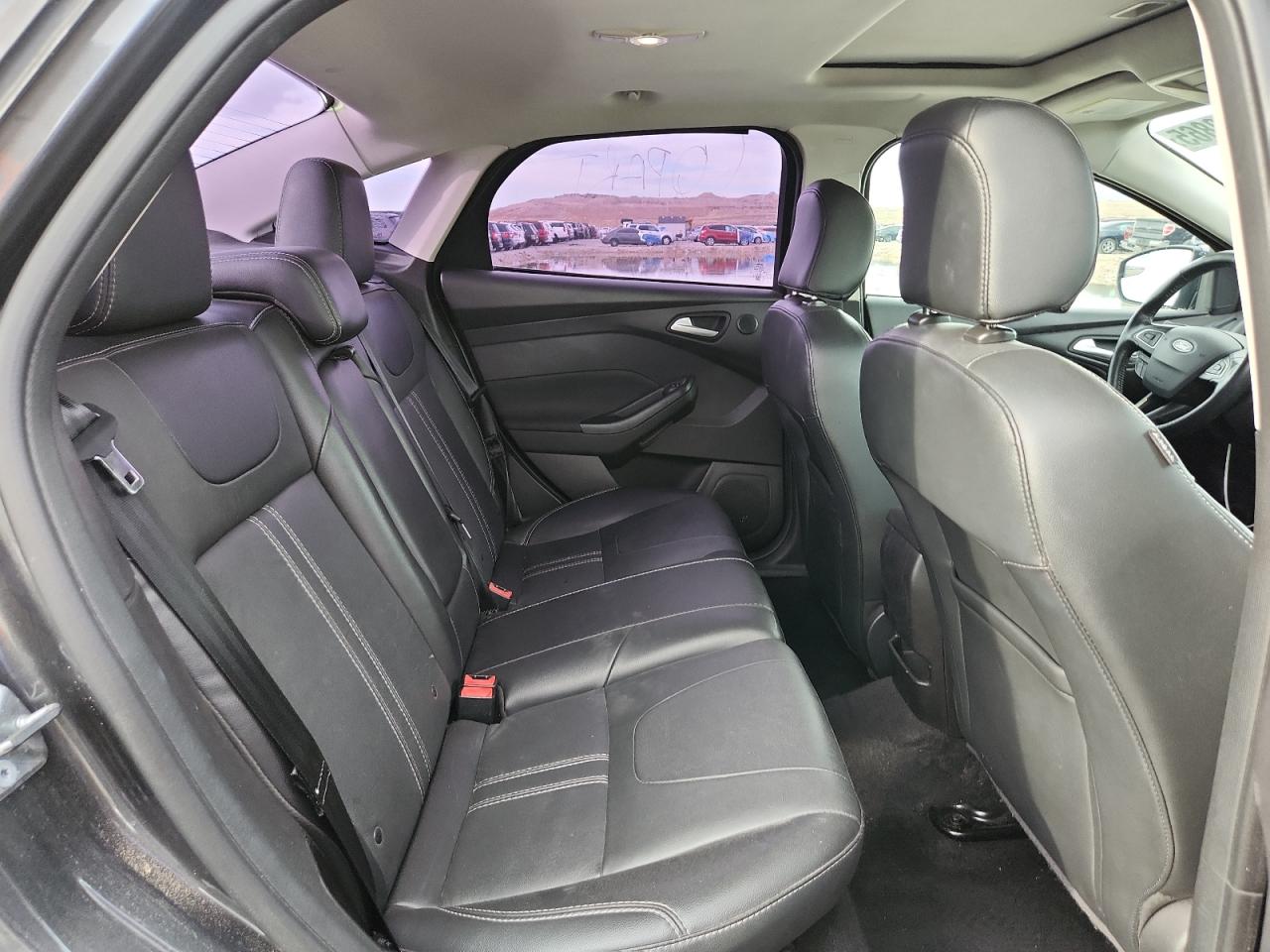 2017 Ford Focus Titanium VIN: 1FADP3J25HL265284 Lot: 86190865