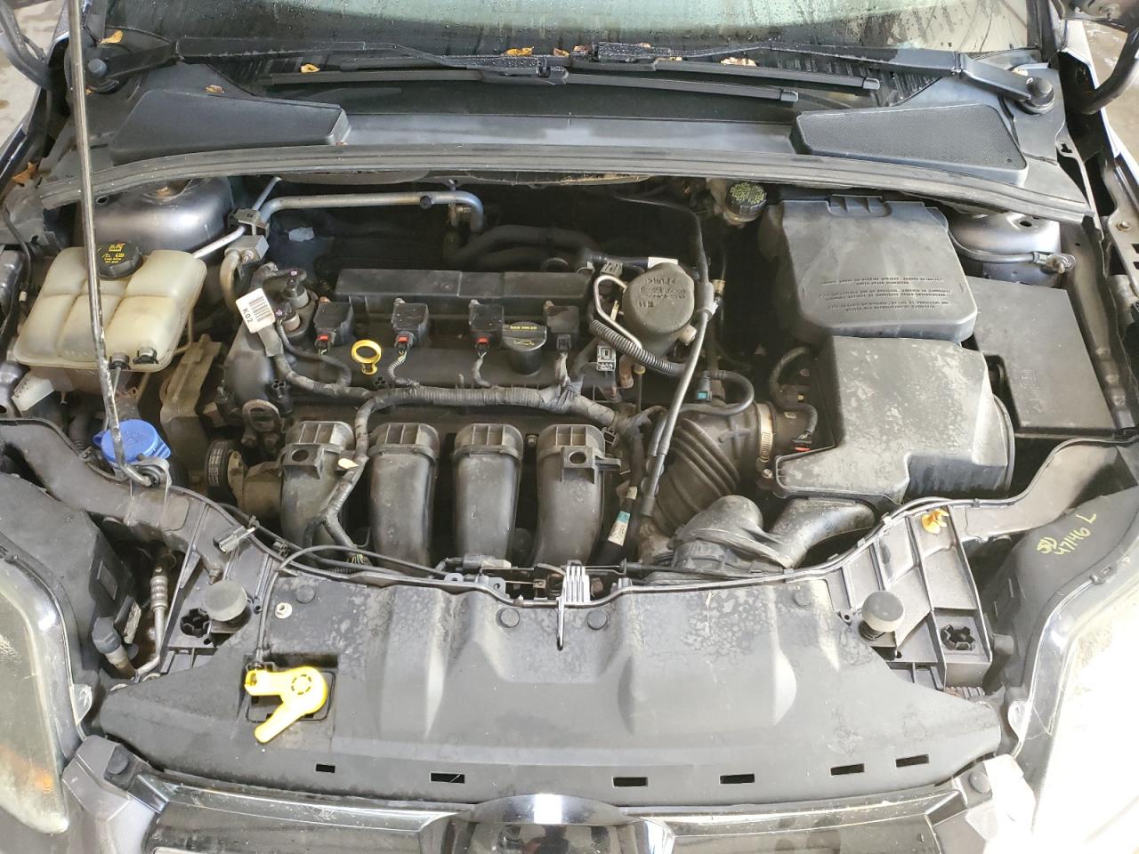 2014 Ford Focus Titanium VIN: 1FADP3J21EL121002 Lot: 84613095