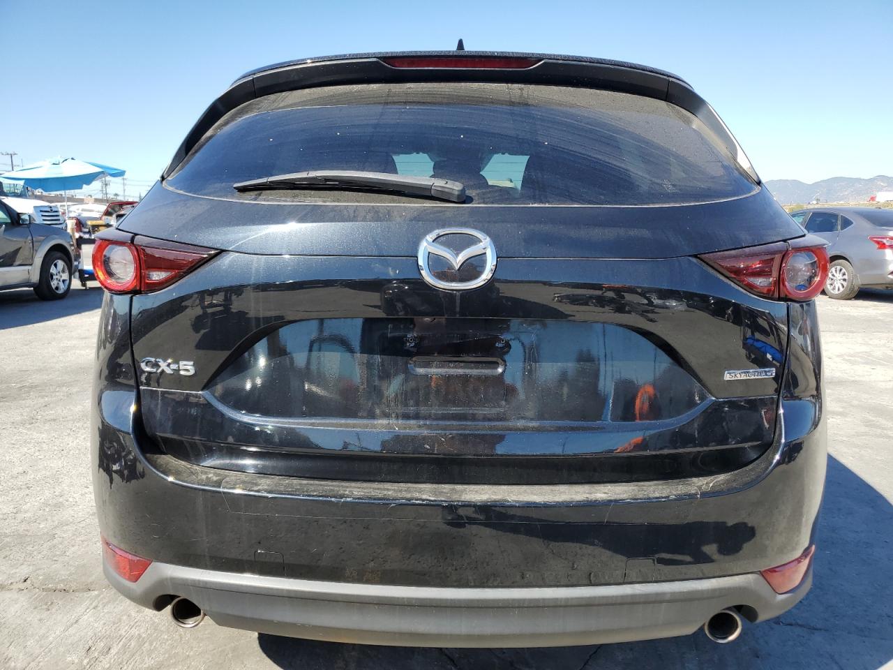 2021 Mazda Cx-5 Touring VIN: JM3KFACM1M1343970 Lot: 90337395