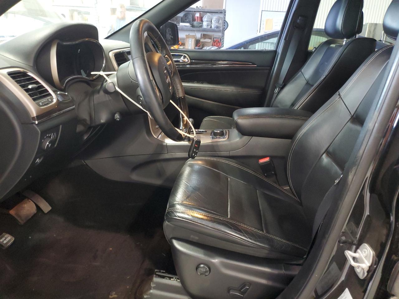 2015 Jeep Grand Cherokee Overland VIN: 1C4RJFCM4FC716655 Lot: 86117405