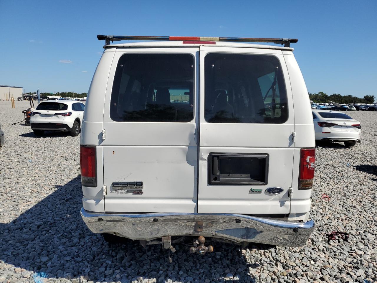 2009 Ford Econoline E350 Super Duty Wagon VIN: 1FBNE31L89DA55131 Lot: 82414385