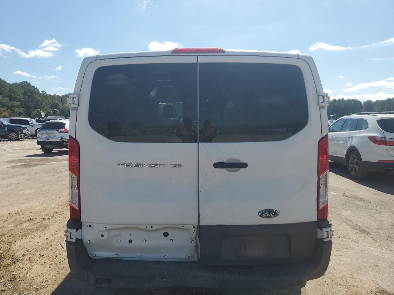 2015 Ford Transit T-150 VIN: 1FTNE1YM4FKB13029 Lot: 86143775