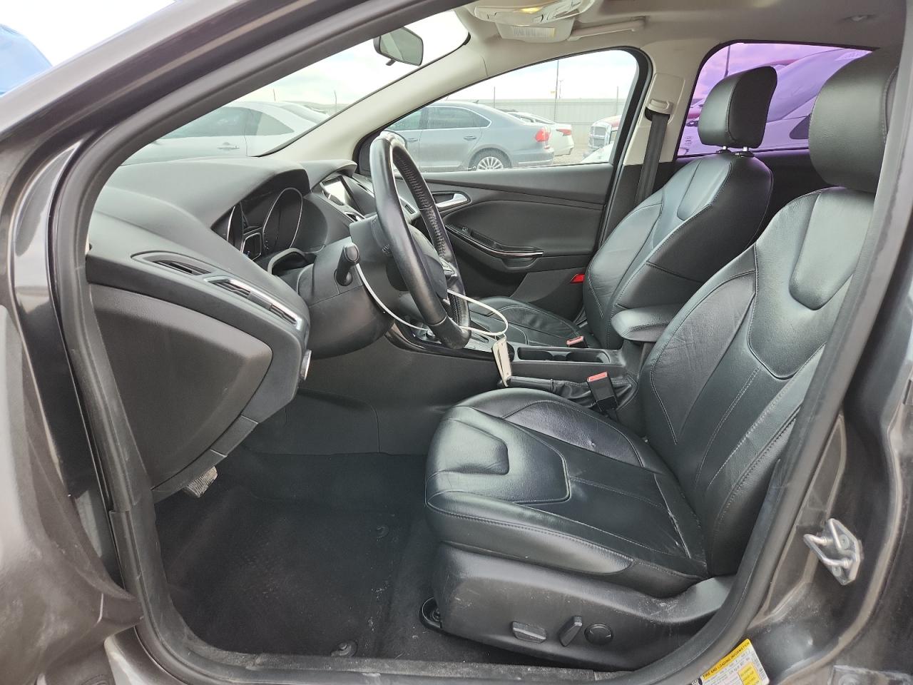 2017 Ford Focus Titanium VIN: 1FADP3J25HL265284 Lot: 86190865