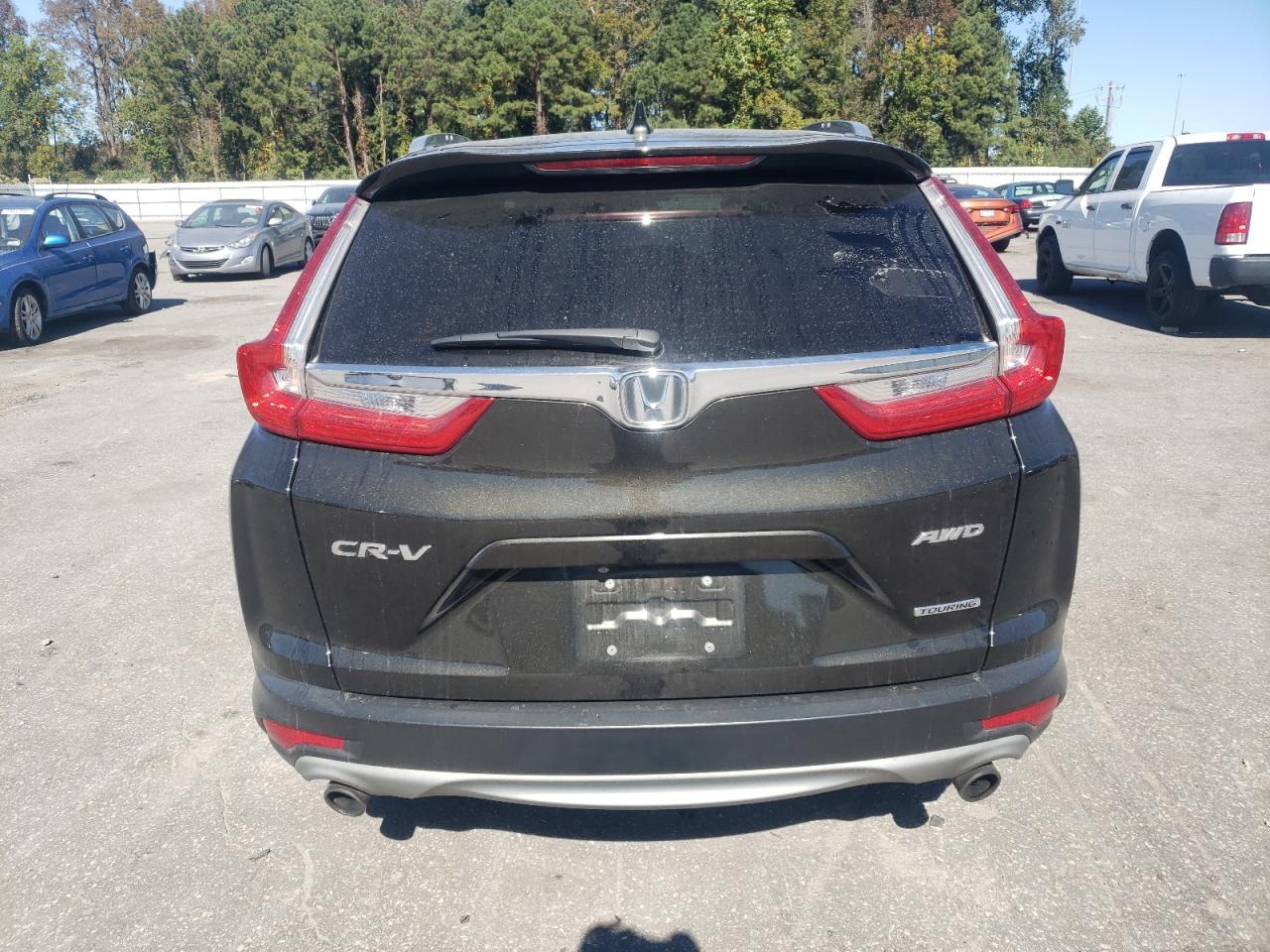 2017 Honda Cr-V Touring VIN: 2HKRW2H94HH660304 Lot: 82678005