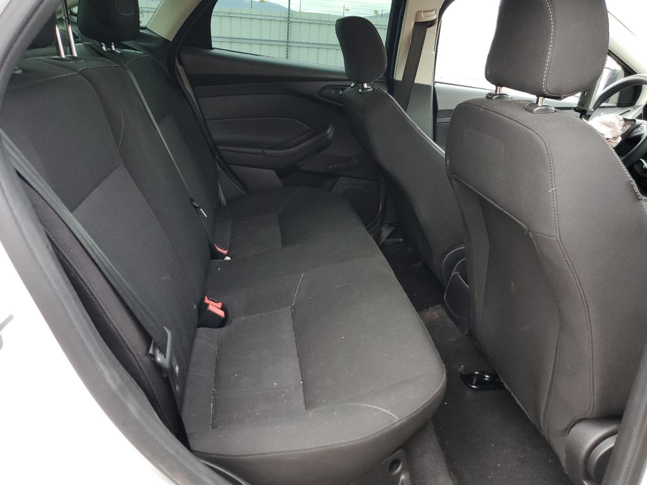 2015 Ford Focus S VIN: 1FADP3E24FL221235 Lot: 82374575