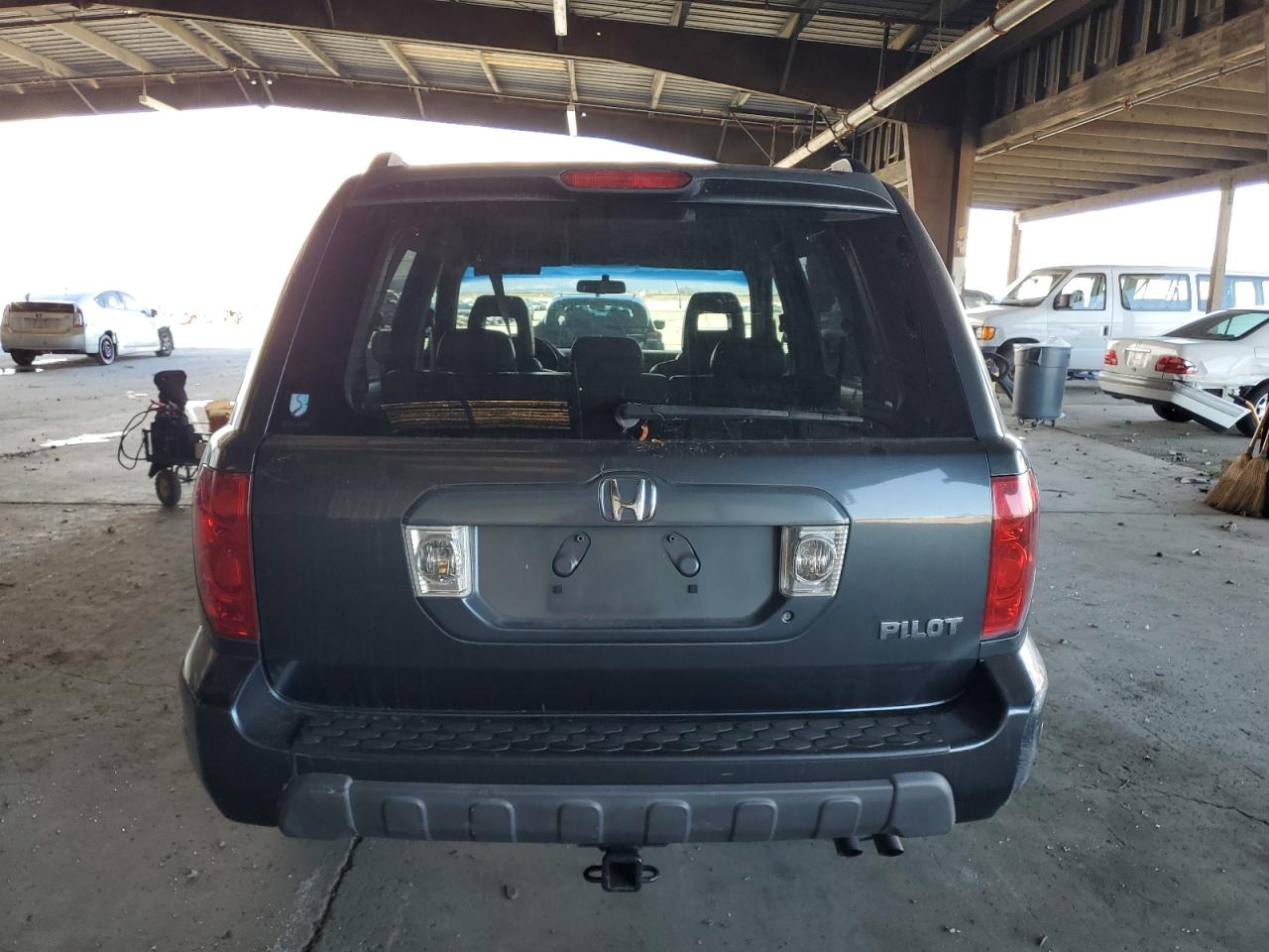 2004 Honda Pilot Exl VIN: 2HKYF18504H596629 Lot: 86279895