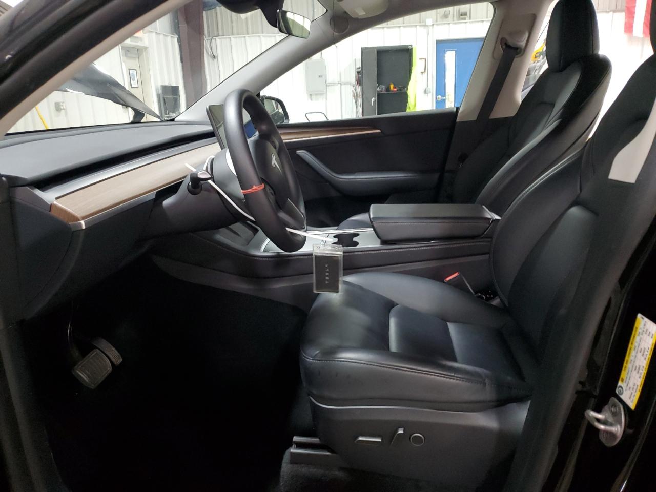 2024 Tesla Model Y VIN: 7SAYGDEE0RF179801 Lot: 87222545