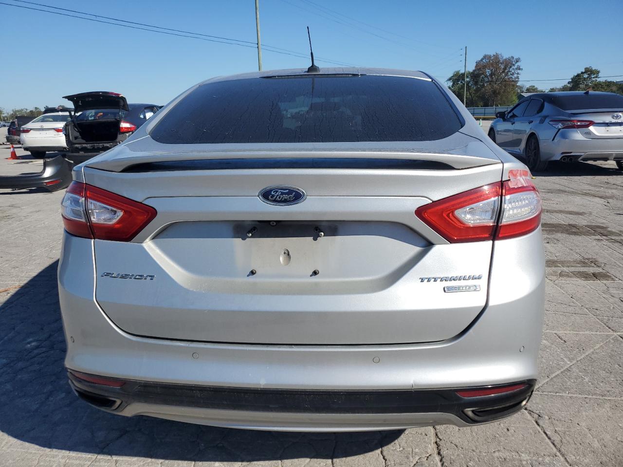 2016 Ford Fusion Titanium VIN: 3FA6P0K91GR207062 Lot: 82386085