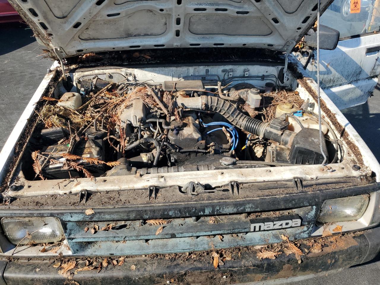 1990 Mazda B2600 Short Body VIN: JM2UF4142L0921693 Lot: 90402055