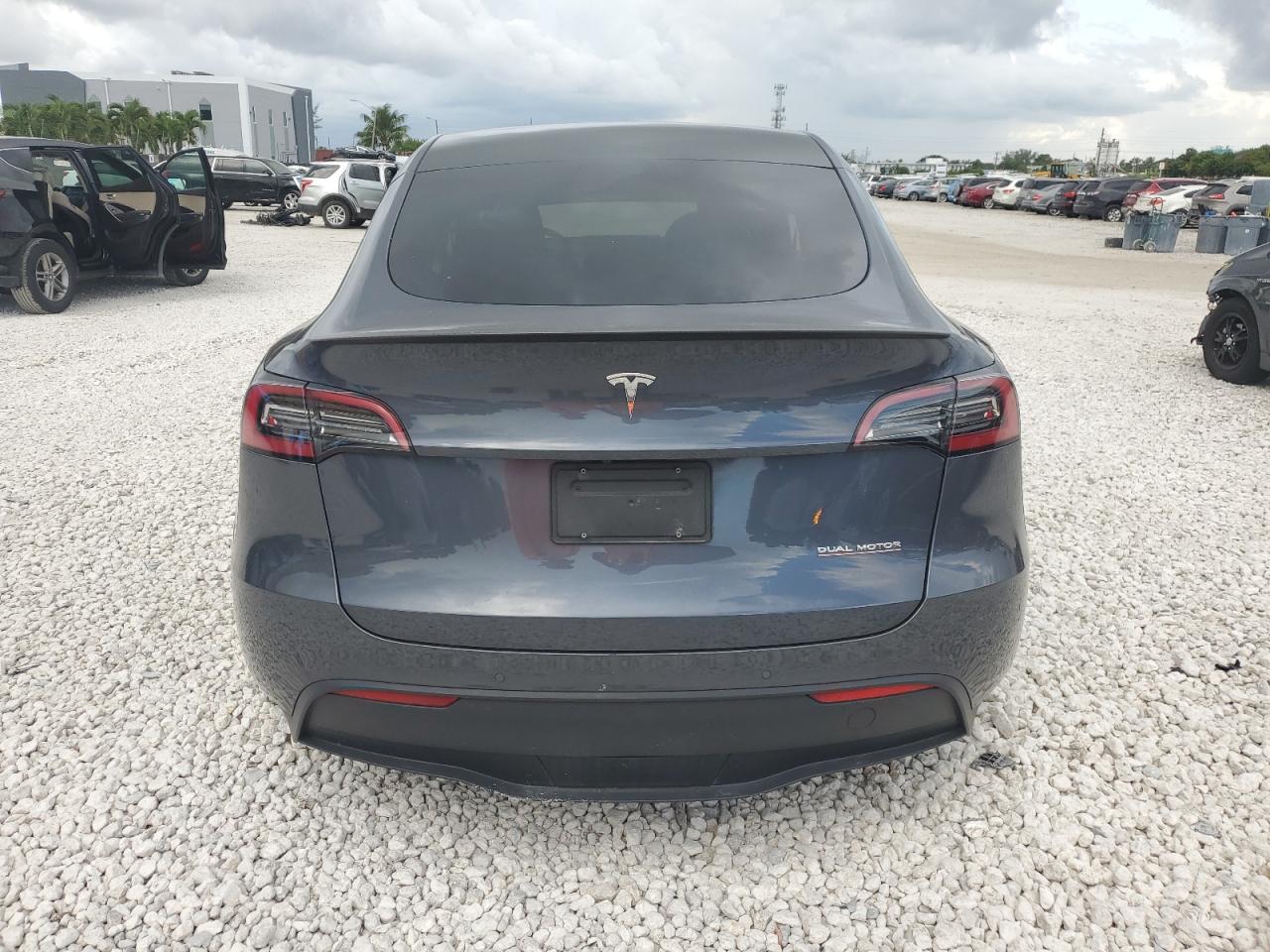 2023 Tesla Model Y VIN: 7SAYGDEFXPF584635 Lot: 87273585