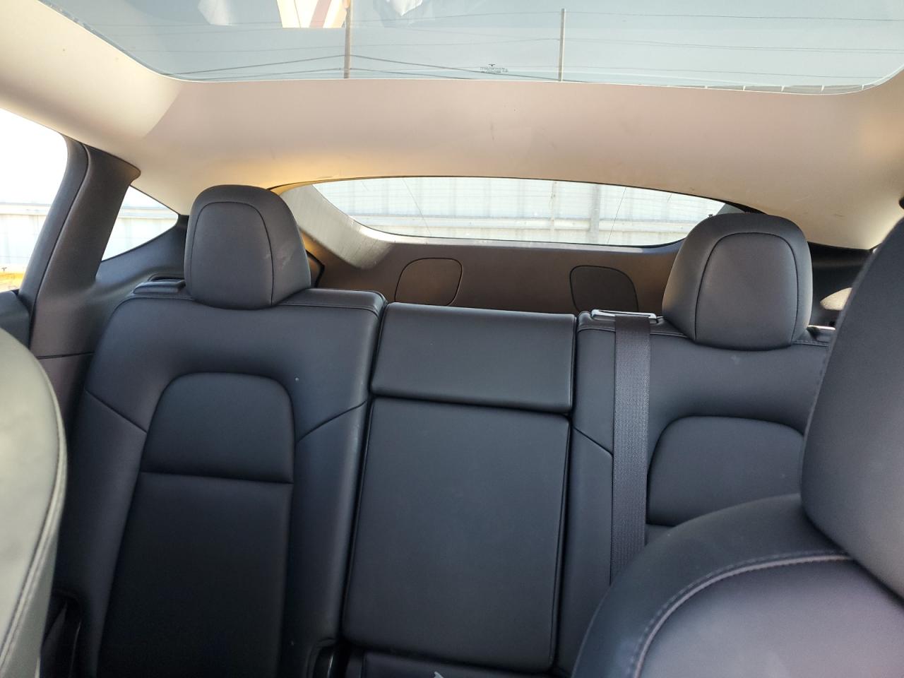 2021 Tesla Model Y VIN: 5YJYGDEE0MF063097 Lot: 82520595