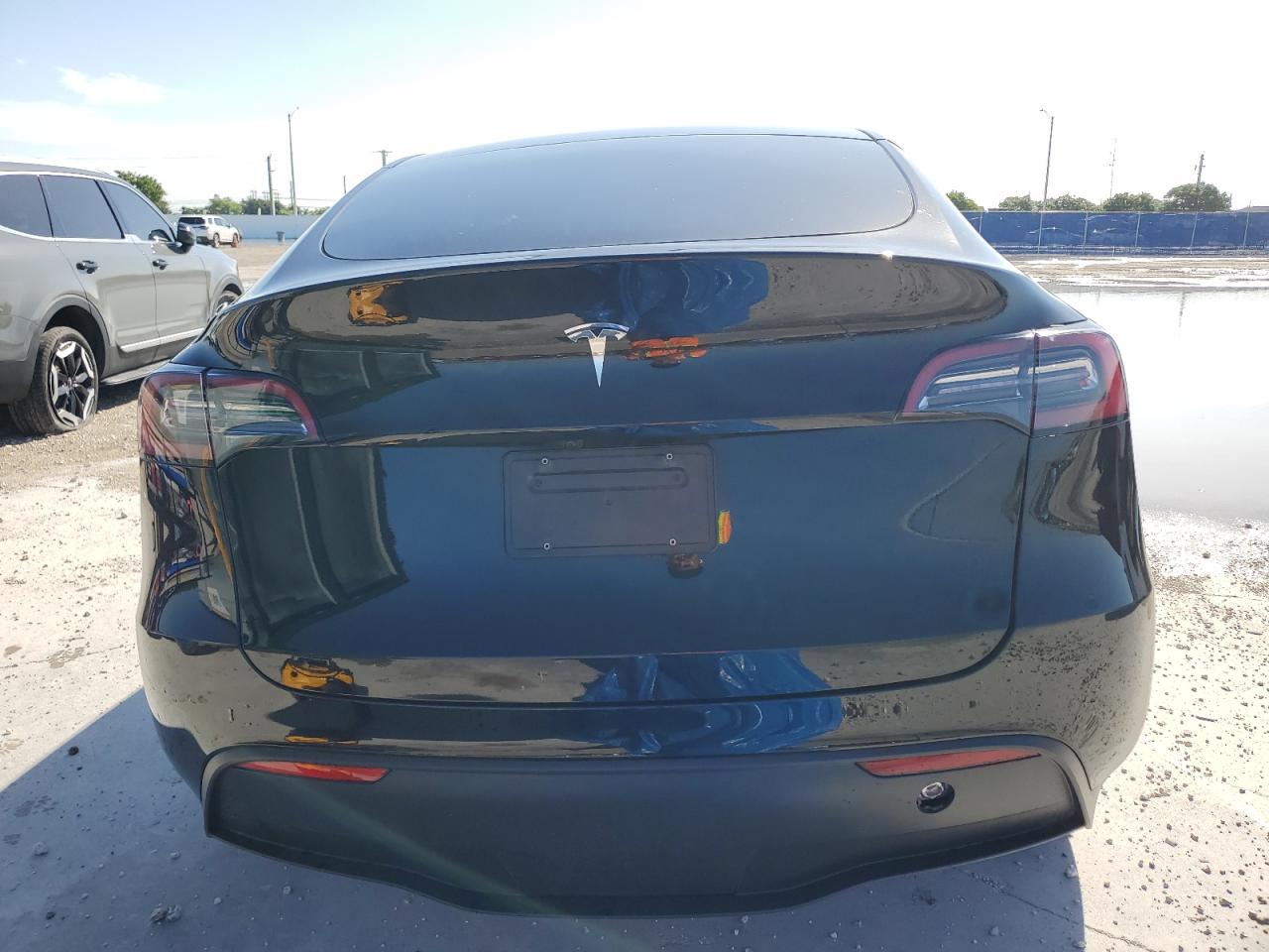 2024 Tesla Model Y VIN: 7SAYGDED9RF089599 Lot: 84059915