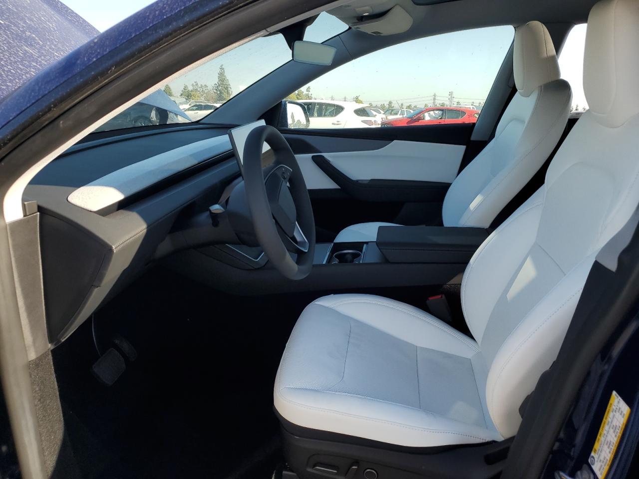 2026 Tesla Model Y VIN: 7SAYGDED5TF424140 Lot: 84655355