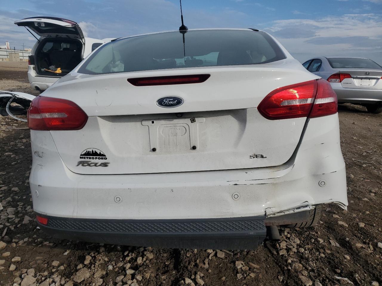 2017 Ford Focus Sel VIN: 1FADP3H28HL302382 Lot: 85692345