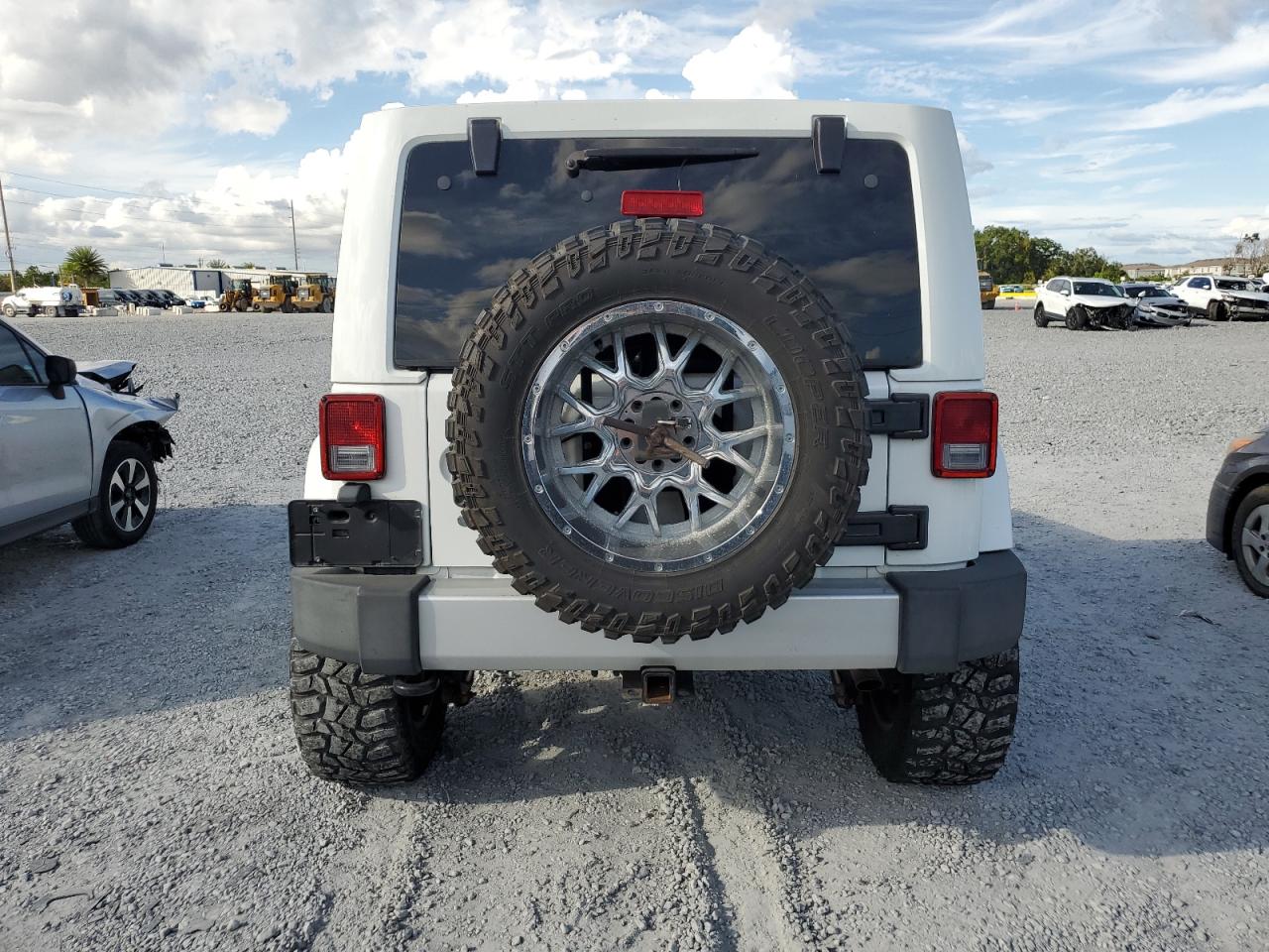 2012 Jeep Wrangler Unlimited Sahara VIN: 1C4BJWEG5CL176205 Lot: 85348825