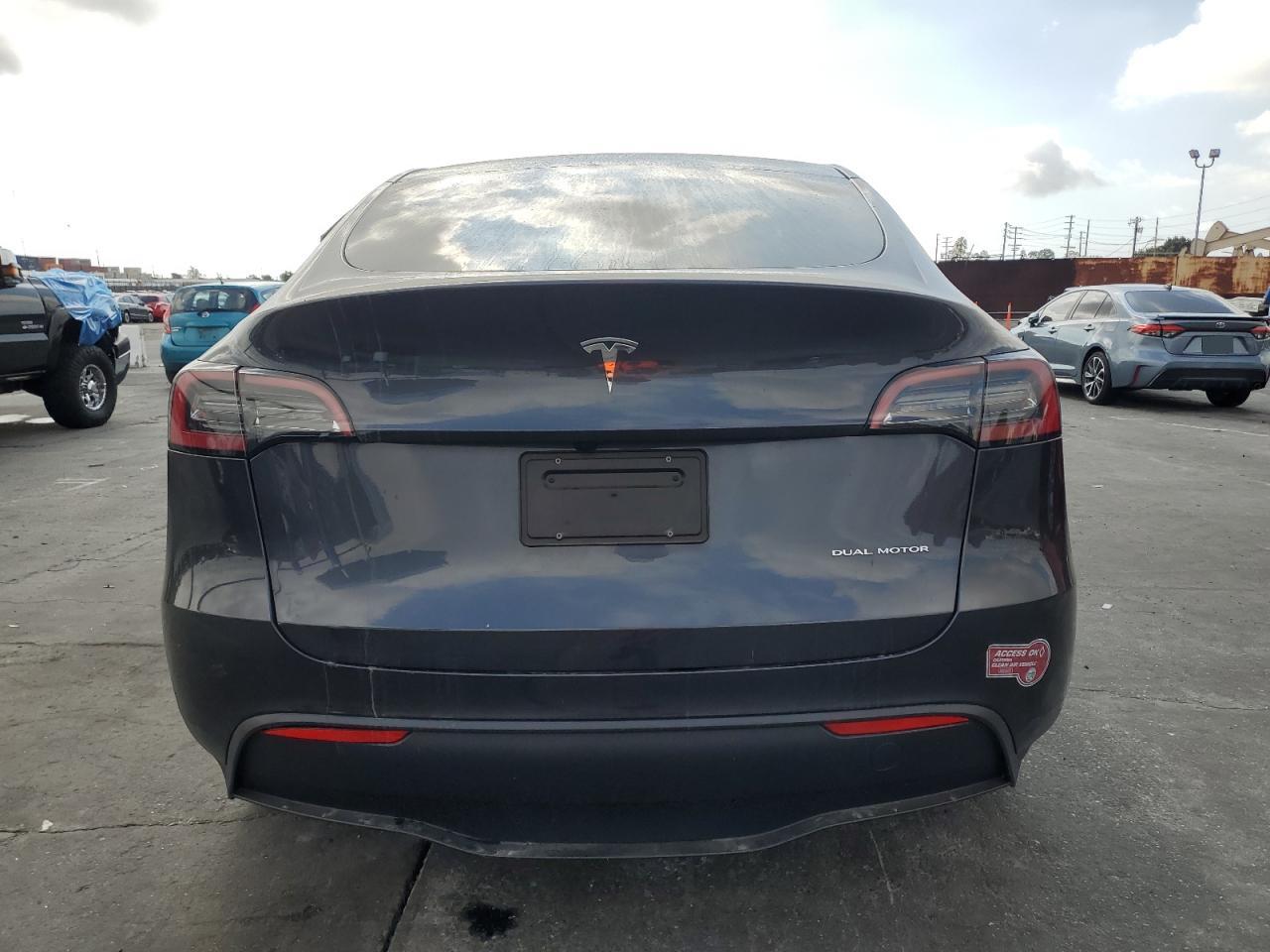 2024 Tesla Model Y VIN: 7SAYGDEE0RA231036 Lot: 87465575
