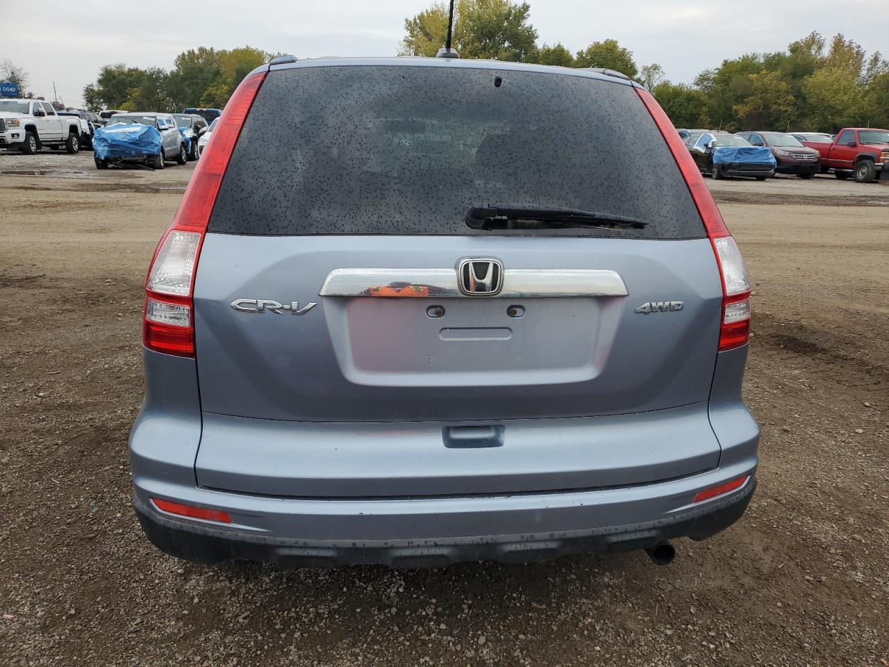 2010 Honda Cr-V Exl VIN: JHLRE4H75AC013959 Lot: 82312855