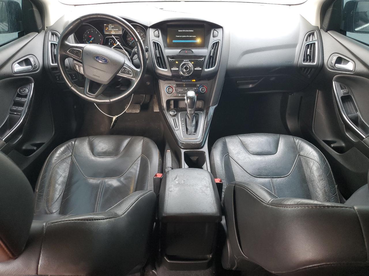 2016 Ford Focus Titanium VIN: 1FADP3N23GL383357 Lot: 82296315