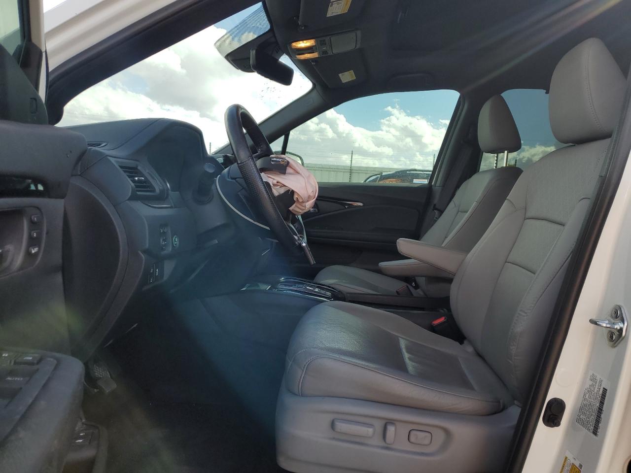 2021 Honda Passport Elite VIN: 5FNYF8H02MB039538 Lot: 82199595