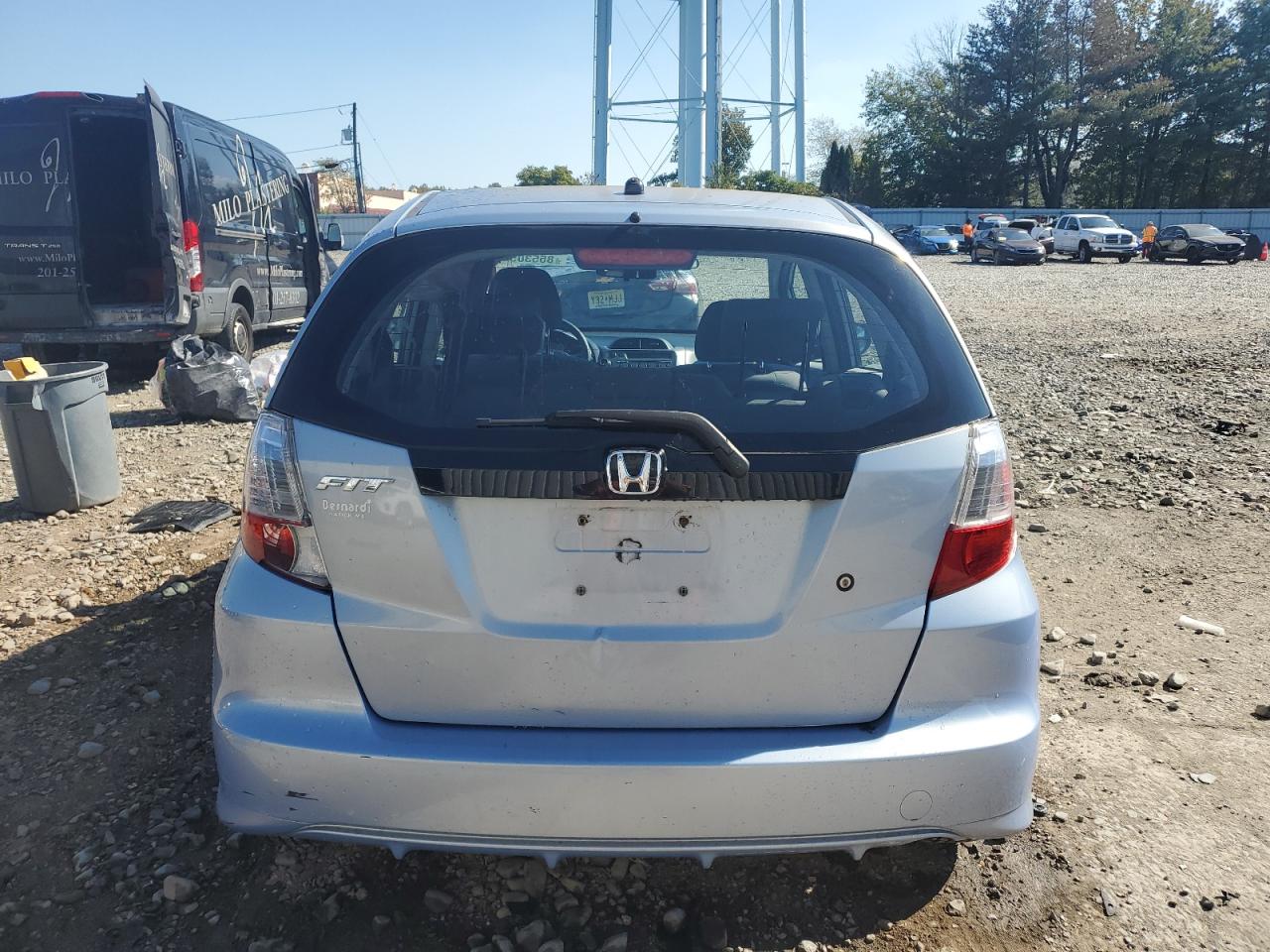 2009 Honda Fit VIN: JHMGE88279S056618 Lot: 85530525