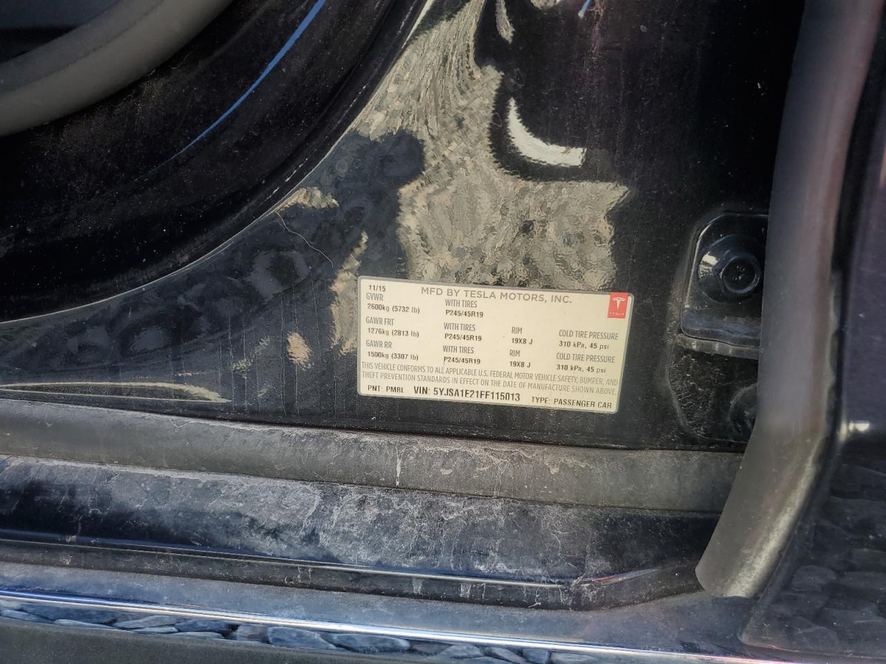 2015 Tesla Model S VIN: 5YJSA1E21FF115013 Lot: 82528595