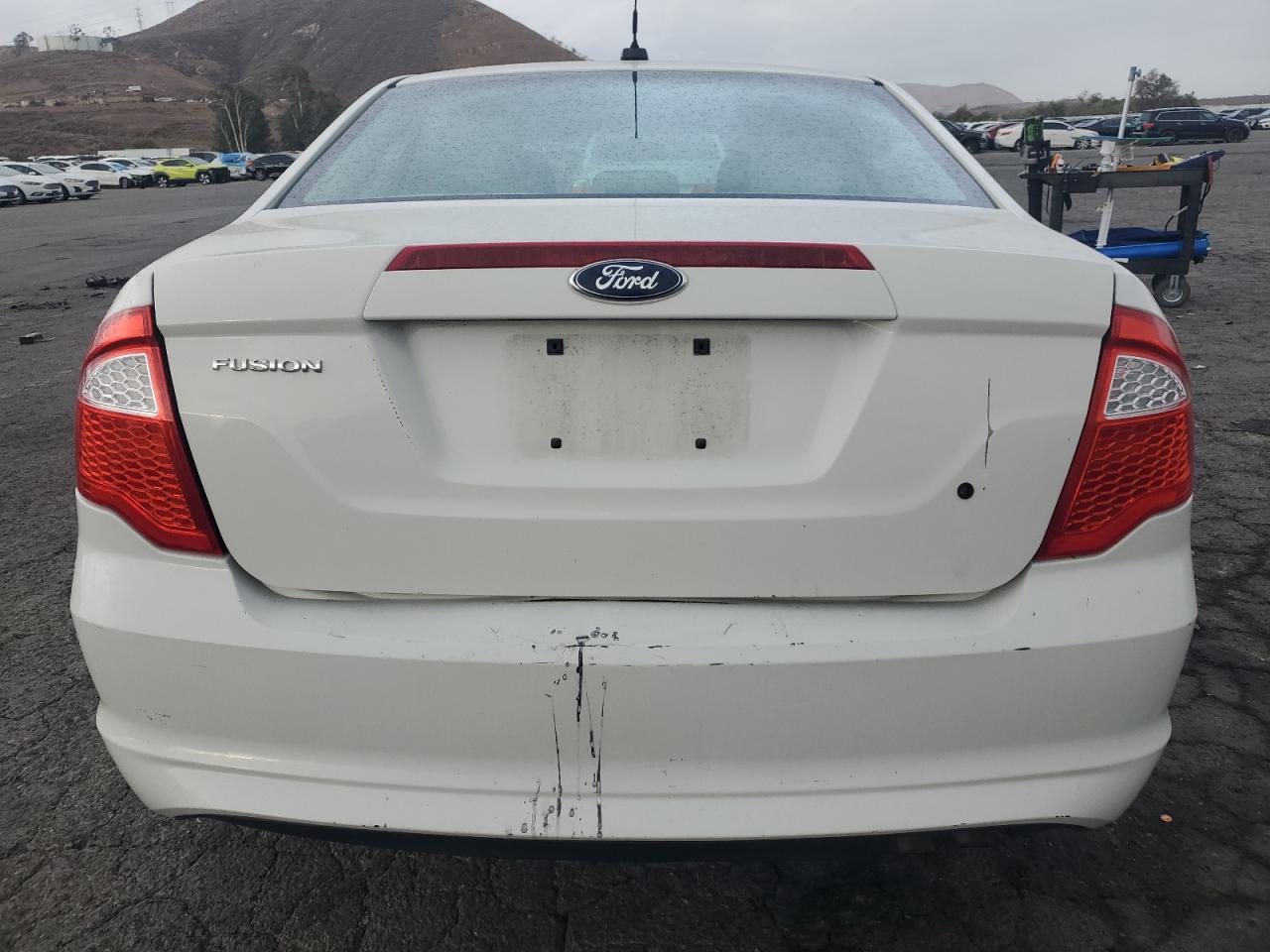 2011 Ford Fusion S VIN: 3FAHP0GA7BR345998 Lot: 86268785