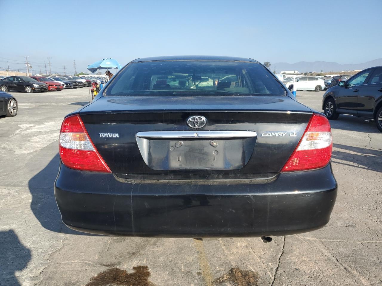 2003 Toyota Camry Le VIN: JTDBE32K130179504 Lot: 81814485