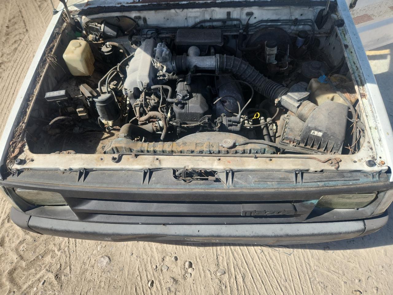 1991 Mazda B2600 Cab Plus VIN: JM2UF3146M0142275 Lot: 90036395
