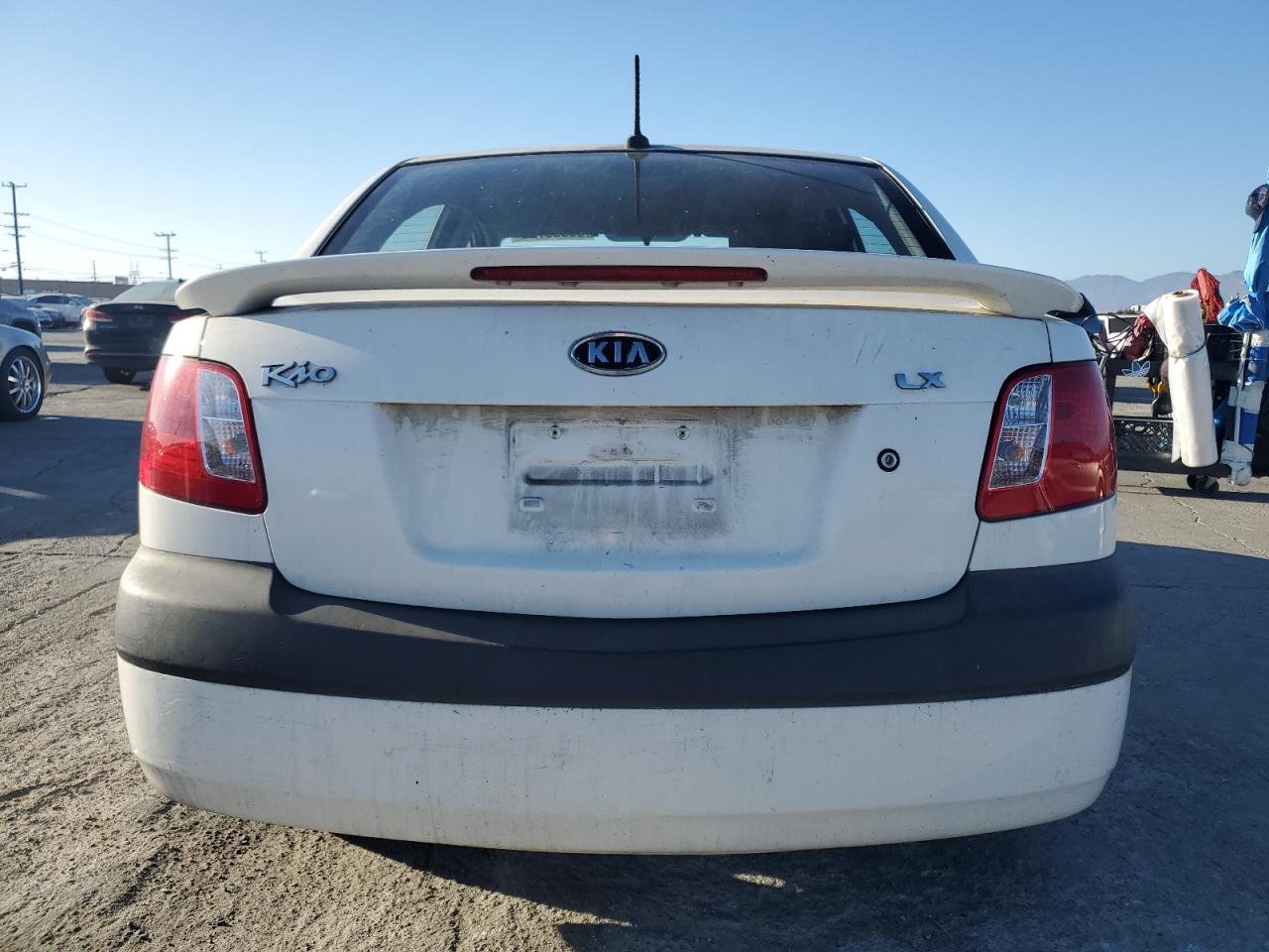 2009 Kia Rio Base VIN: KNADE223296569512 Lot: 85008725