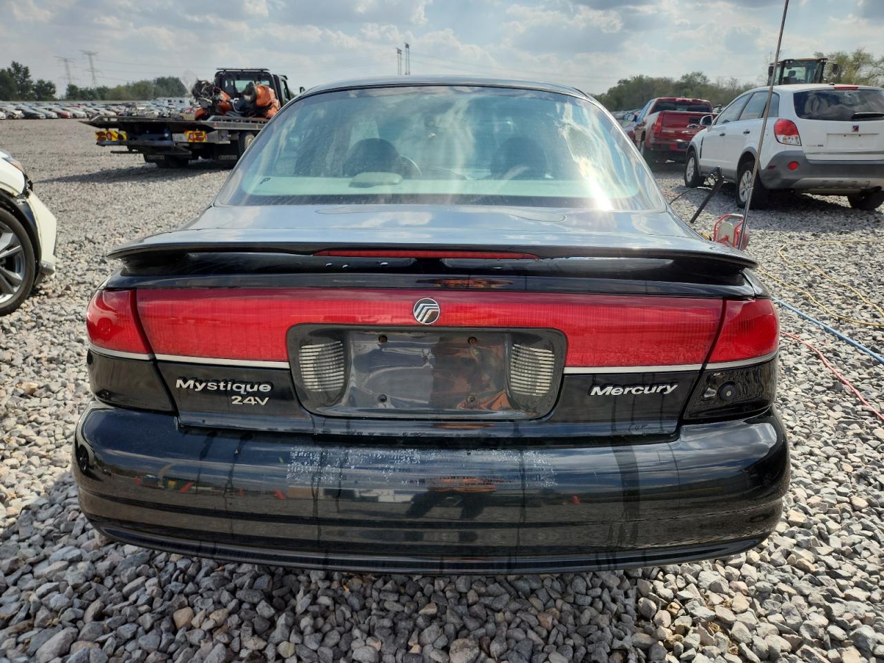 1999 Mercury Mystique Ls VIN: 1MEFM66L7XK610610 Lot: 85193725