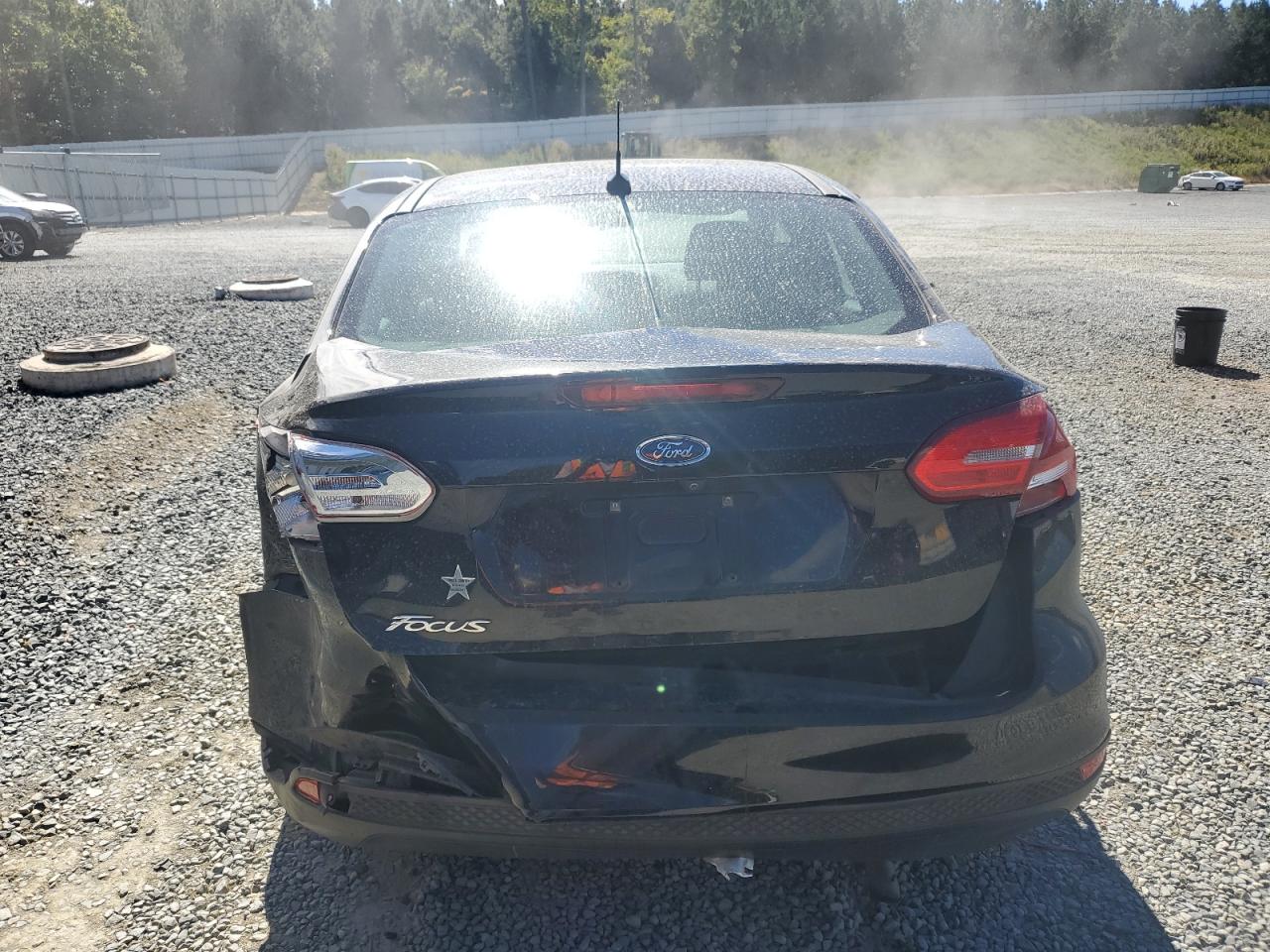 2017 Ford Focus S VIN: 1FADP3E23HL221097 Lot: 82450025