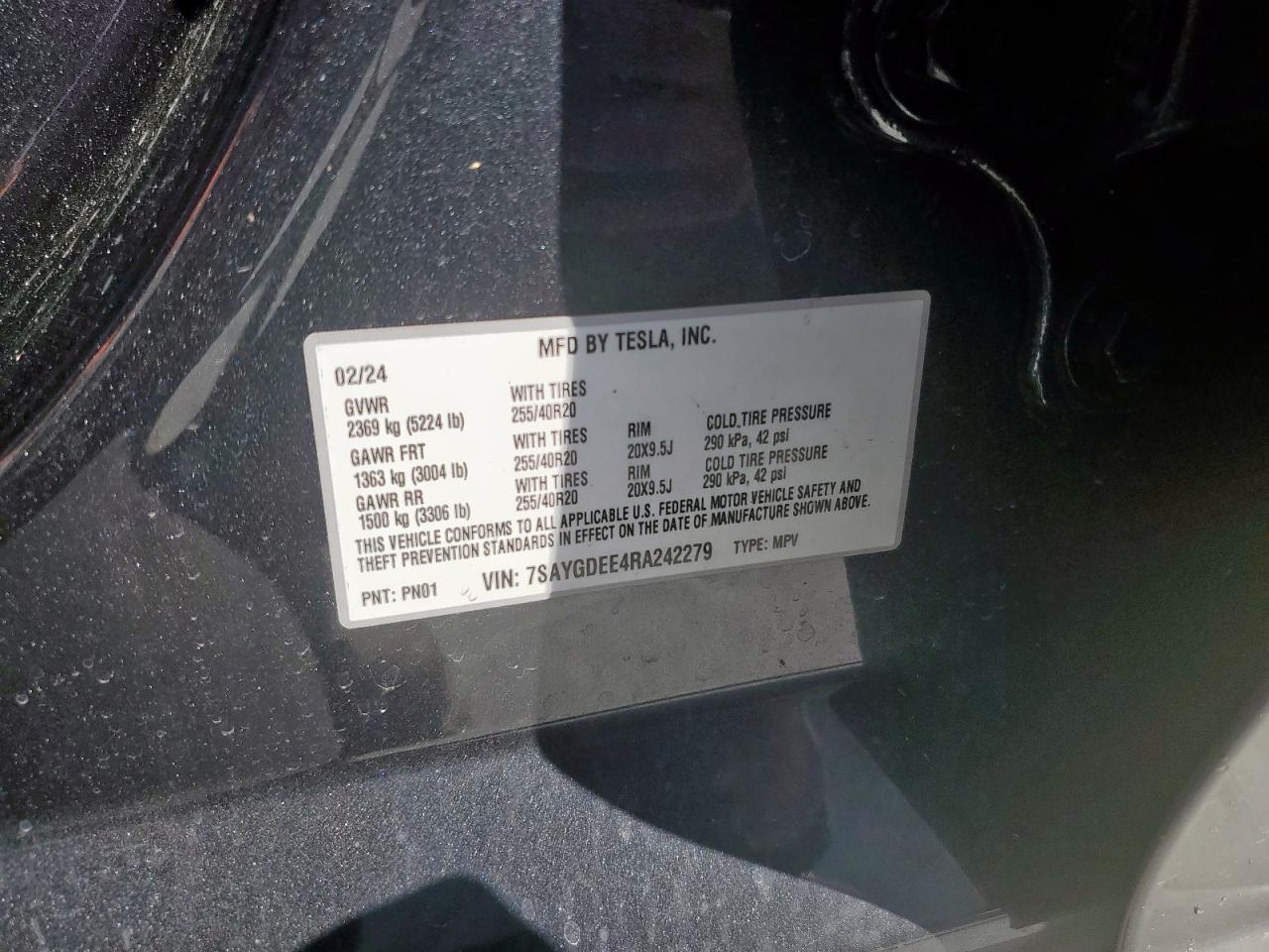 2024 Tesla Model Y VIN: 7SAYGDEE4RA242279 Lot: 84740555