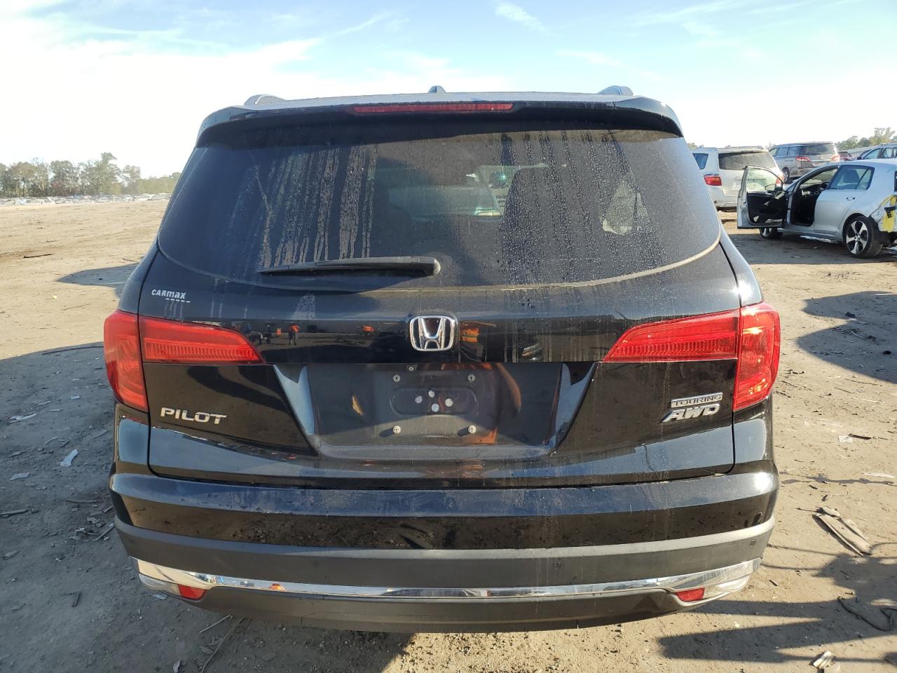 2016 Honda Pilot Touring VIN: 5FNYF6H93GB078579 Lot: 85550525