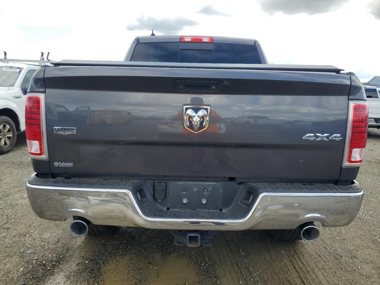 2016 Ram 1500 Laramie VIN: 1C6RR7NM9GS211589 Lot: 86789465