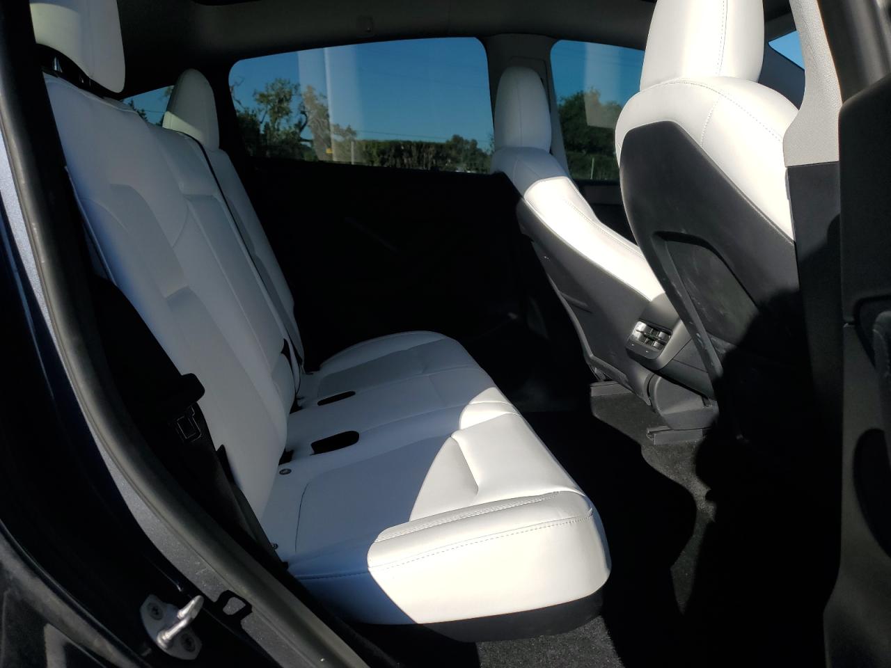 2023 Tesla Model Y VIN: 7SAYGDEE8PF910424 Lot: 82636635