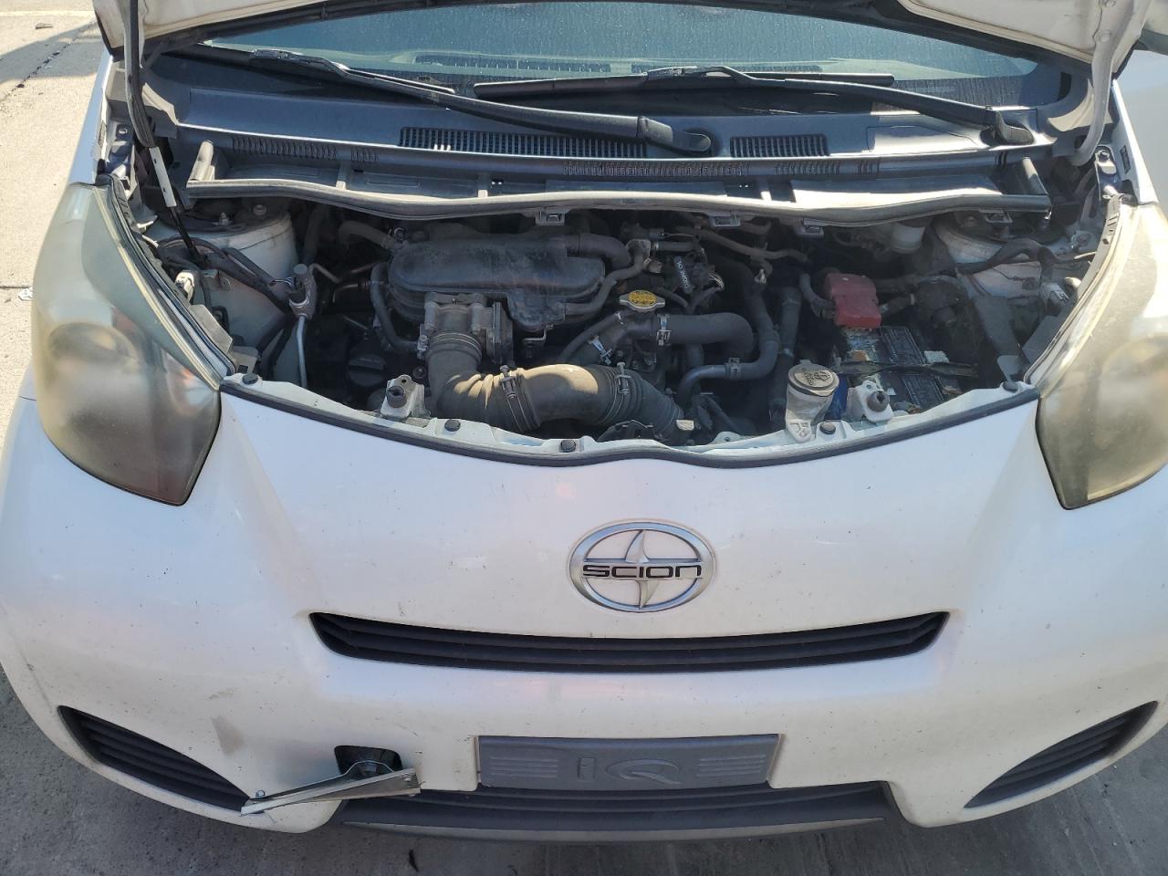 2012 Toyota Scion Iq VIN: JTNJJXB00CJ013977 Lot: 89777015