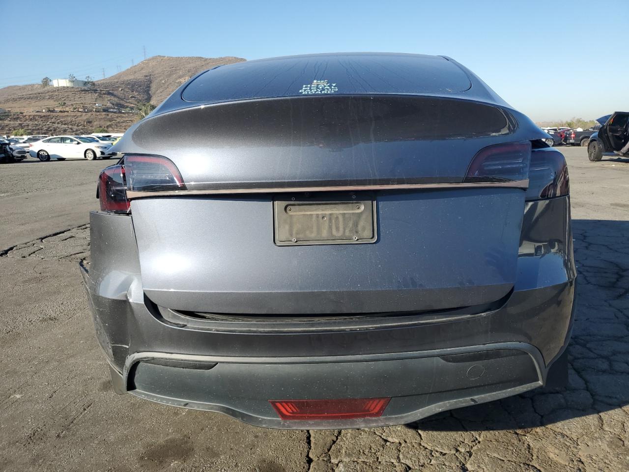 2023 Tesla Model Y VIN: 7SAYGAEE0PF621181 Lot: 89871235