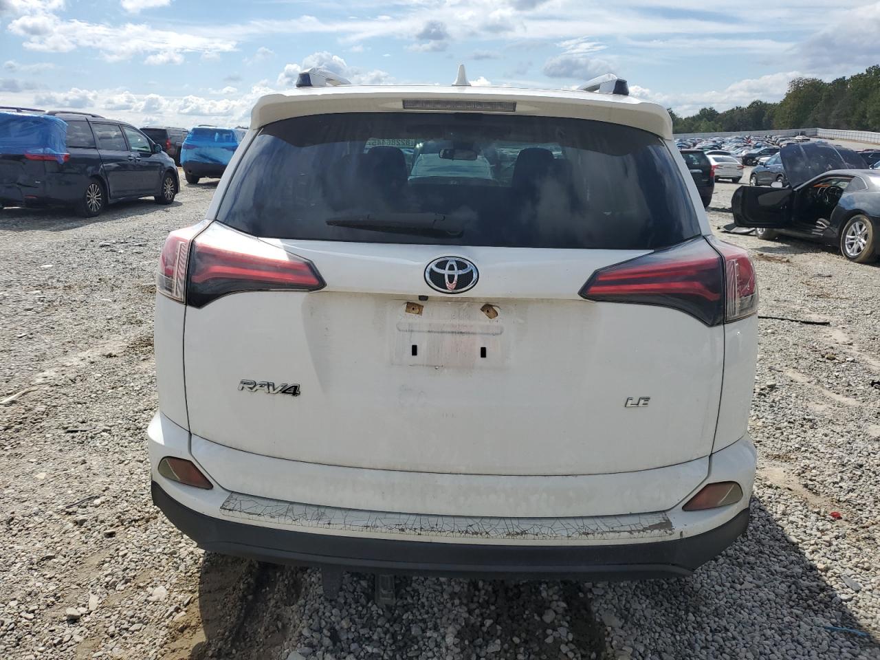 2018 Toyota Rav4 Le VIN: JTMZFREV2JJ180608 Lot: 82286445