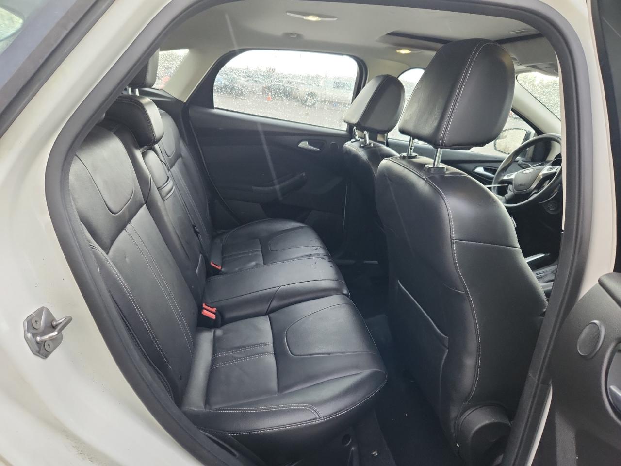 2012 Ford Focus Titanium VIN: 1FAHP3N20CL434793 Lot: 86642085